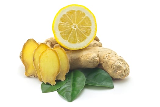 Ginger, green leaves and half a lemon