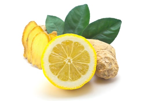 Ginger, green leaves and half a lemon