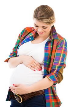 Beautiful pregnant white woman wearing shirt with hands on belly isolated on a white background