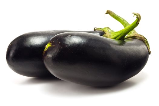 young ripe eggplant on a white background