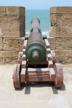 Portuguese cannon in fortress battlements facing the sea
