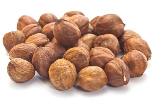 small group of kernels of a filbert isolated on a white background