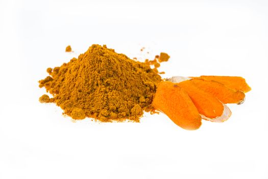 turmeric powder with fresh turmeric root on white background