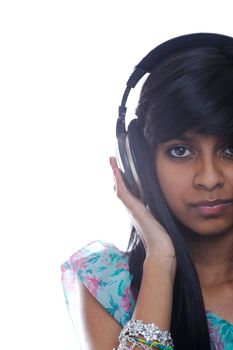 Teen girl holding headphones