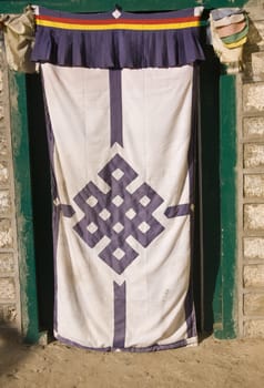 Traditional Tibetan style entrance to a house in the village of Namche Bazar in the Nepalese Himalayas.