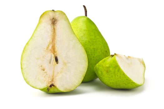 one green pear and a cut portion on a white background