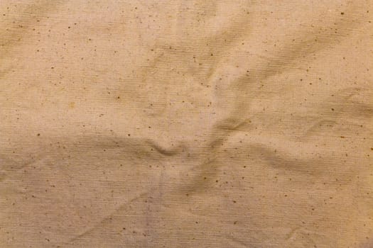 texture of the old, yellowed and crumpled canvas