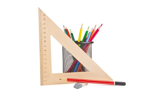 triangle, a basket for pencils, erasers, colored pencils on white background