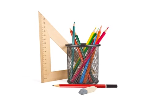 triangle, a basket for pencils, erasers, colored pencils on white background