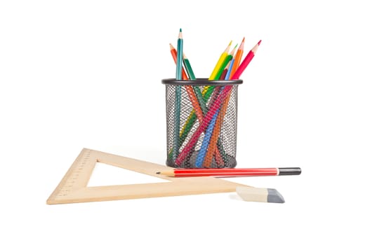 triangle, a basket for pencils, erasers, colored pencils on white background