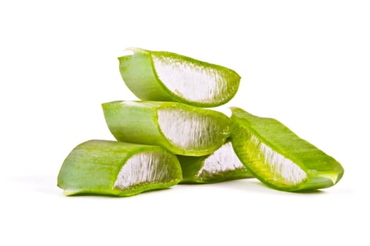 Juicy slices of aloe on white background