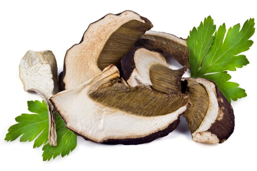 Dried slices of porcini mushrooms on a white background