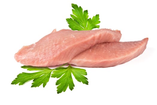 two pieces of fresh meat and parsley leaves on white background