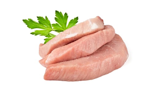 three pieces of fresh meat and parsley leaves on white background