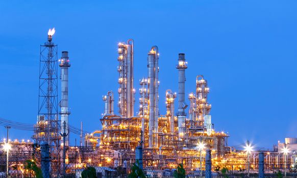 Lighting from structure of oil and chemical factory with blue sky background