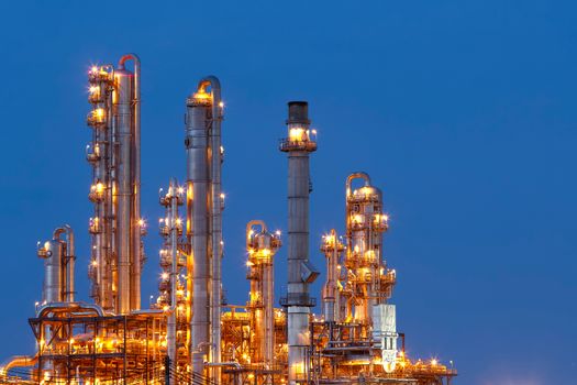 Lighting from structure of oil and chemical factory with blue sky background