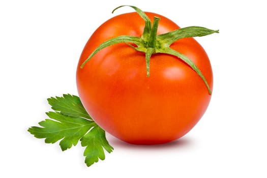 Single fresh, ripe tomato and parsley leaf on white background