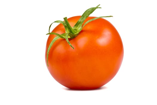 Single fresh, ripe tomato with peduncles isolated on white background