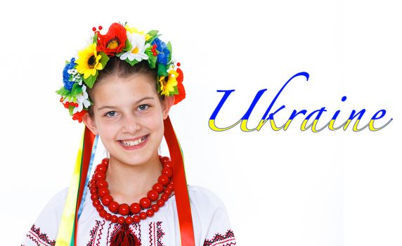 Portrait of happy cute girl in the Ukrainian national costume. Isolated white background
