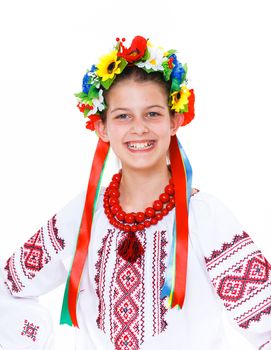 Portrait of happy cute girl in the Ukrainian national costume. Isolated white background