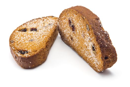 sweet rusks with raisins sprinkled with sugar on a white background