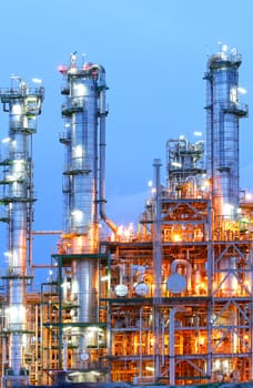 Lighting from structure of oil and chemical factory with blue sky background