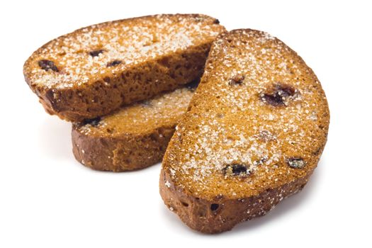 sweet rusks with raisins sprinkled with sugar on a white background