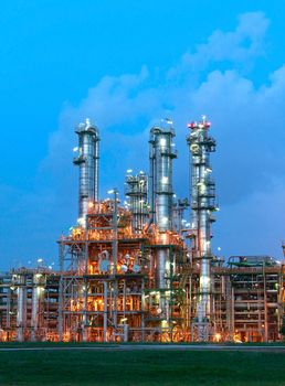 Lighting from structure of oil and chemical factory with blue sky background