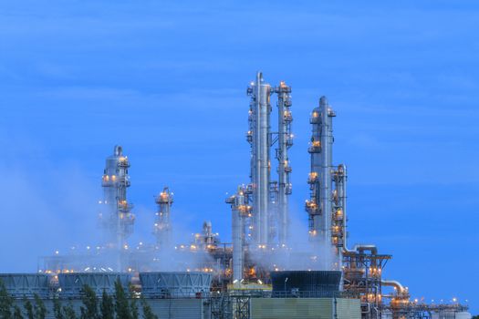 Lighting on structure of oil and chemical refinery plant on twilight time