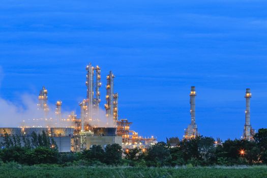Lighting on structure of oil and chemical refinery plant on twilight time