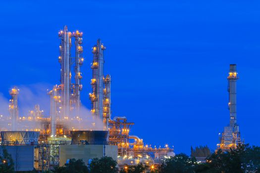 Lighting on structure of oil and chemical refinery plant on twilight time