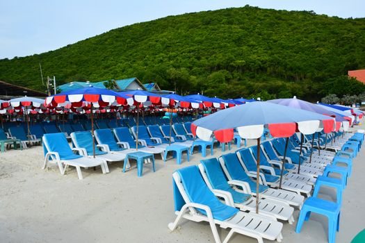 beach chairs and umbrella at Koh Larn, Pataya,Thailand