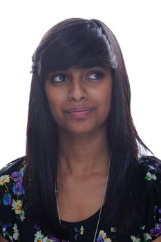 Indian teenage girl looks sideways