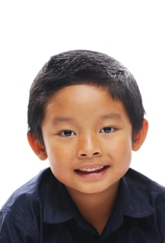 Asian boy smiling looking at camera wears blue shirt