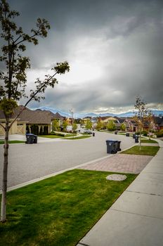 Stormy Skies Over An Emptied Average Suburban Street