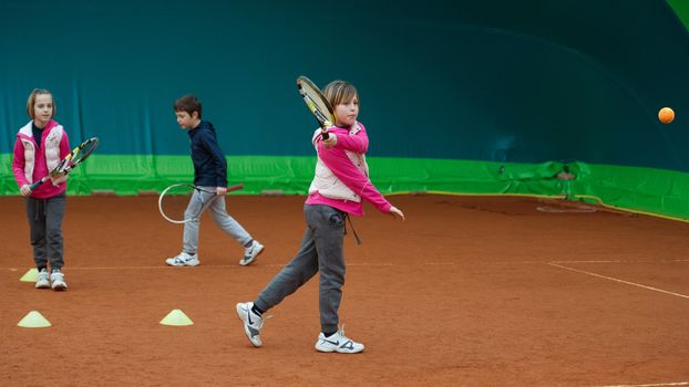 children to tennis school