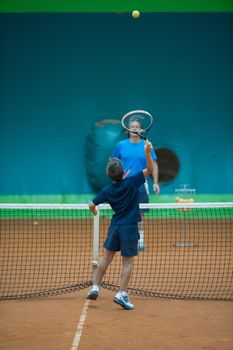 Children at school during a dribble of tennis