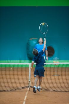 Children at school during a dribble of tennis