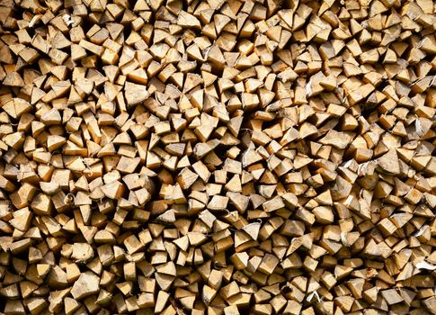 Stack of dry firewood texture
