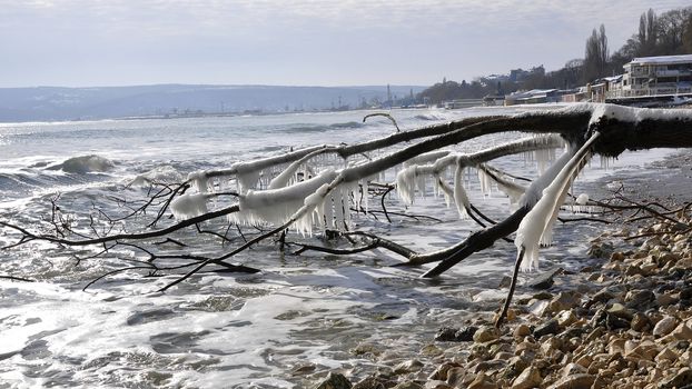 Ice forms a glaze on the beaches of the Black Sea 