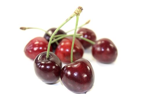 fresh red sweet juicy cherries on a light background