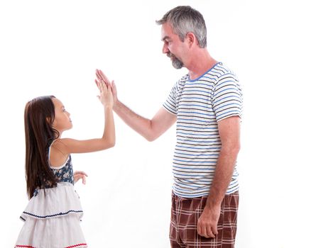 Dad high fiving daughter, palms together on isolated white