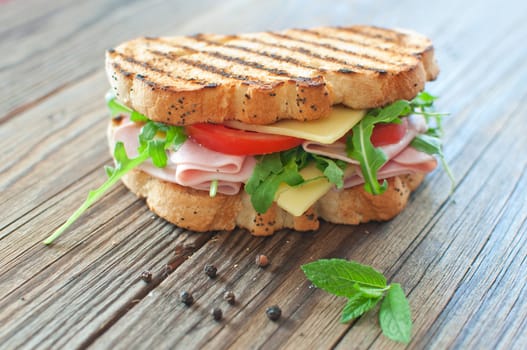 Grilled deli sandwich with ham and cheese 