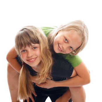 Two young happy female friends having fun