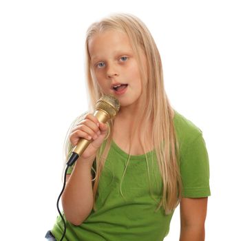 A young blonde girl singer with a golden microphone