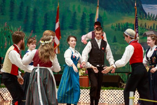 Astoria, Oregon, USA - June 21, 2014:  Young dancers from LEIKARRINGEN of Portland perform Scandinavian dance at  Midsummer Festival.