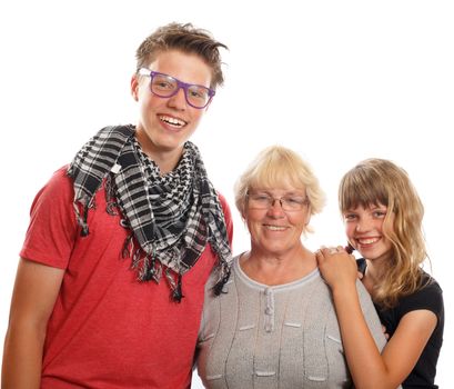 A elderly grandmother with her granddaughter and grandson