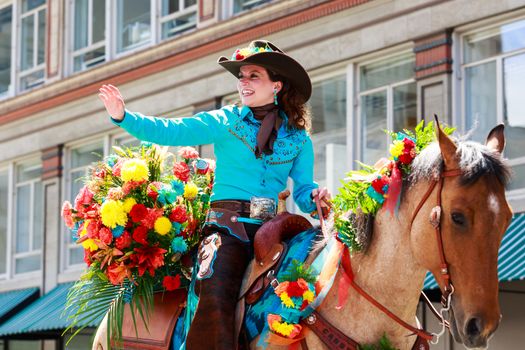 Portland, Oregon, USA - JUNE 7, 2014: Clackamas County Fair & Canby Rodeo in Grand floral parade through Portland downtown.