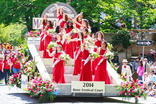 Portland, Oregon, USA - JUNE 7, 2014: 2014 Rose Festival Court in Grand floral parade through Portland downtown.