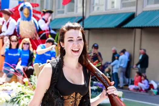 Portland, Oregon, USA - JUNE 7, 2014: Character Clown Corps in Grand floral parade through Portland downtown.